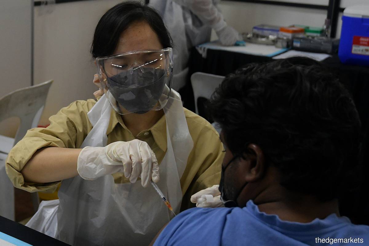 Stern action should be taken against anti-Covid-19 vaccine groups that spread false news, according to the prime minister. (Photo by Mohd Suhaimi Mohamed Yusuf/The Edge)